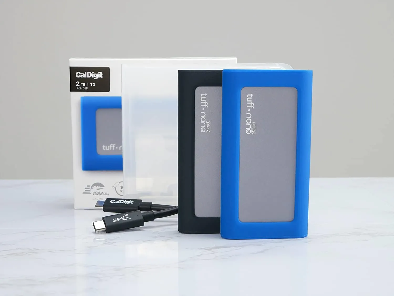 CalDigit Tuff Nano Plus 2TB - Compact Rugged IP67 Waterproof USB-C 3.2 Gen 2 10Gb/s External NVME SSD, Compatible with Thunderbolt 4 Mac and PC, Up to 1055MB/s (2TB Nano Plus, Charcoal Black)