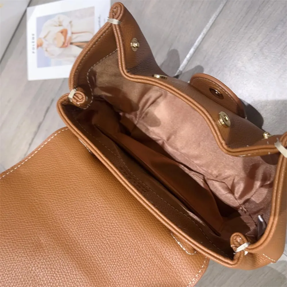 Single-shoulder crossbody handbag, piggy bag, handbag with litchi grain pattern and smiling face design